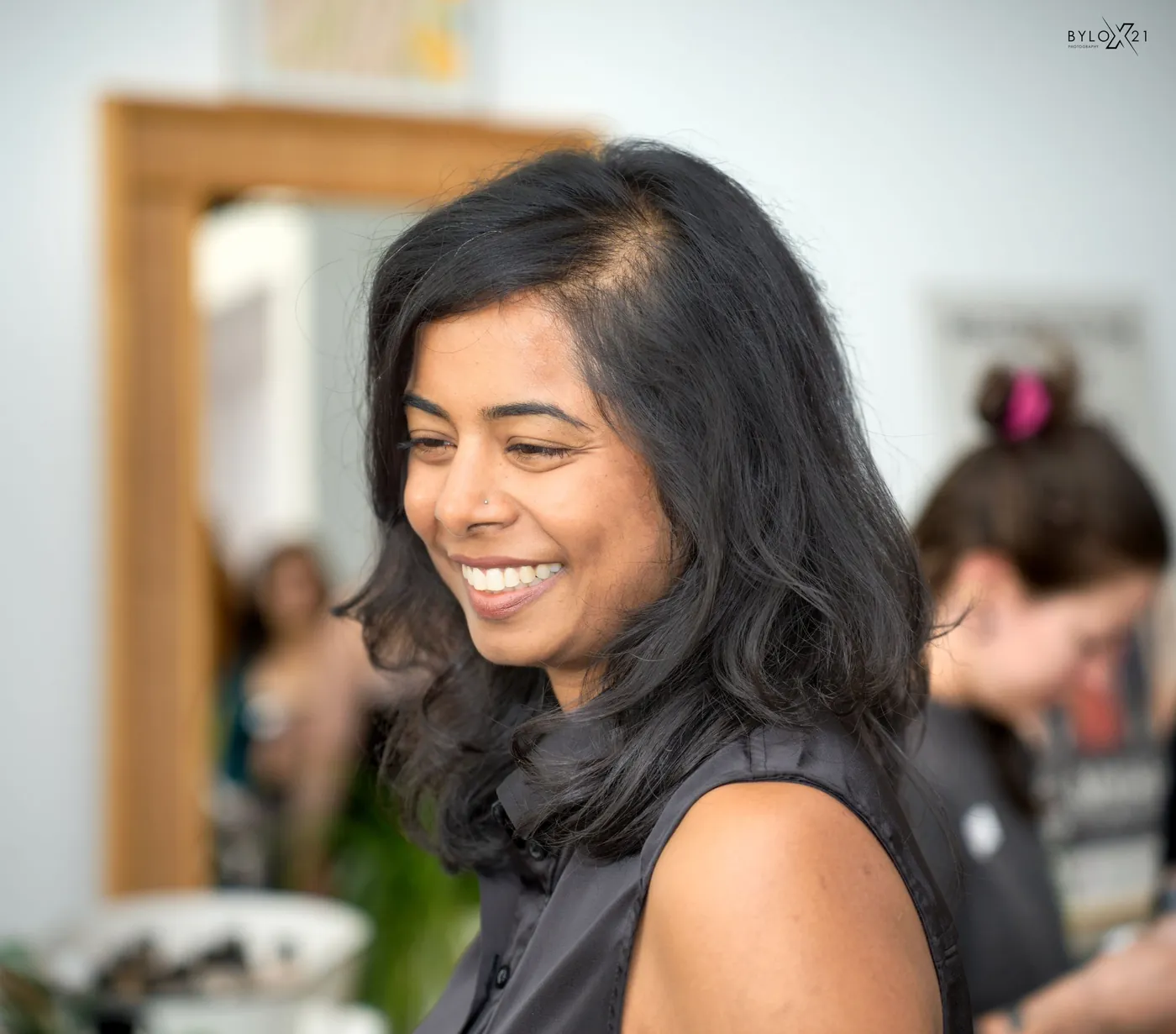 Naba Ahsan, founder of Pelvactiv, smiling and looking down